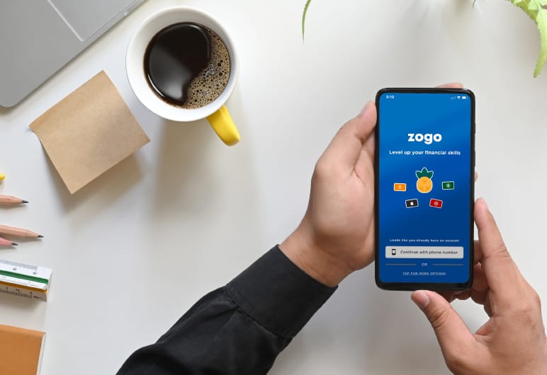 zogo app with coffee at a desk