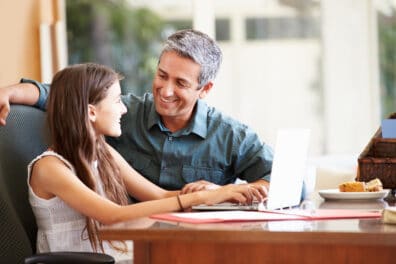 Father with his daughter giving her instruction